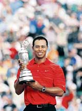 Tiger Woods of the USA holds the Claret Jug after winning the 135th British Open Golf Championship at Hoylake, Liverpool, on Sunday