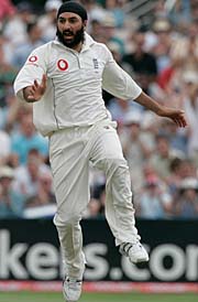 England�s Monty Panesar celebrates after dismissing Pakistan�s Imran Farhat on the third day of the second Test at Old Trafford, Manchester, on Saturday.