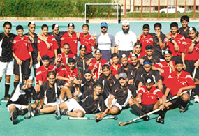 The winning hockey team of Government Model High School, Sector 42, along with their coach Jasbir Bajwa. 