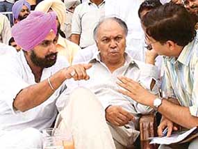 Finance Minister Surinder Singla and PPCC general secretary Raninder Singh at a function to launch plantation drive in Bathinda on Wednesday.