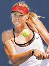 Russia�s Maria Sharapova hits a shot to Mary Pierce of France during the Acura Classic in Carlsbad, California, on Friday