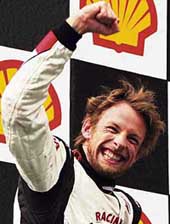Jenson Button of Great Britain celebrates after winning the Hungarian Grand Prix in Budapest on Sunday.