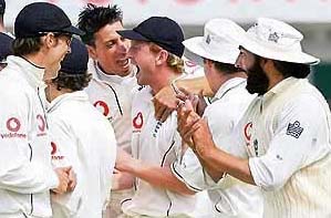 England�s Paul Collingwood is congratulated by team-mates after running out Pakistan�s Mohammad Yousuf during the fifth day of the third Test at Headingley in Leeds on Tuesday.
