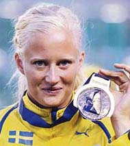Sweden�s Carolina Kluft poses on the podium after winning the women�s heptathlon at the 19th European Athletics Championships in Gothenburg, Sweden, on Tuesday.
