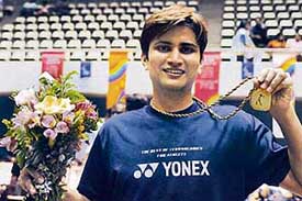 Chetan Anand show the gold medal