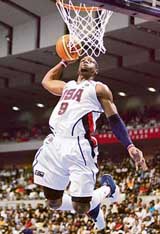 Dwyane Wade of the USA jumps to dunk the ball during the first-round match against China at the World Basketball Championship in Sapporo on Sunday. The USA won 121-90
