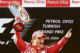 Formula One driver Felipe Massa of Brazil celebrates after winning the Turkish Grand Prix in Istanbul