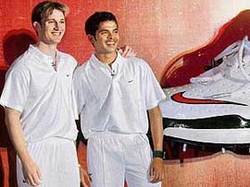 New Zealand speedster Shane Bond with Indian pacer S. Sreesanth at a promotional function in Mumbai