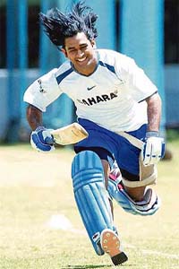 Mahendra Singh Dhoni in action on the fourth day of the rolling camp at the National Cricket Academy in Bangalore