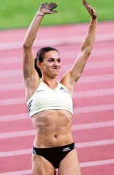 World record holder Yelena Isinbayeva of Russia rejoices after winning the women�s pole vault event at the Daegu Athletics Meet in South Korea on