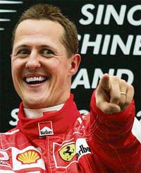 Ferrari�s Formula One driver Michael Schumacher of Germany celebrates after winning the Chinese Grand Prix in Shanghai