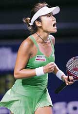 Japan�s Akiko Morigami reacts as she gets a point during the first round match against Russian Maria Kirilenko at the Japan Open tennis tournament in Tokyoon Monday. Morigami won 1-6, 6-2, 7-6.