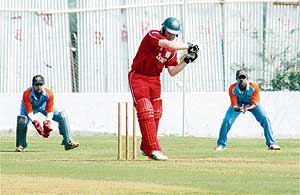 Zimbabwe�s T. Duffin bats during the warm-up match against GCA President�s XI at the Motera Stadium