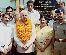 The Union Minister of State for Industries, Dr Ashwani Kumar, and a former Punjab minister, Dr Malti Thapar, after paying floral tributes to a former Prime Minister, the late Rajiv Gandhi, in whose name an auditorium was inaugurated in Moga on Wednesday.