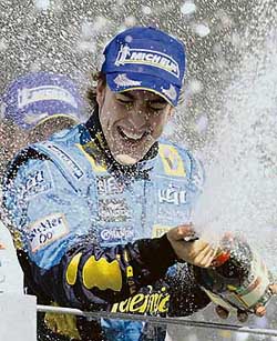 Renault�s Fernando Alonso of Spain sprays champagne after winning the Formula One title in Sao Paulo, Brazil, on Sunday. 