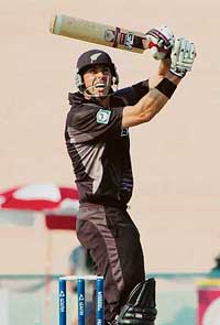 New Zealand captain Stephen Fleming hits a six during a Champions Trophy match against Pakistan at the PCA Stadium in Mohali on Wednesday. 