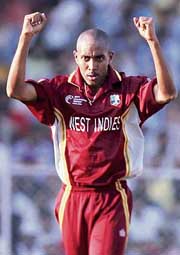 Ian Bradshaw of the West Indies celebrates after taking the wicket of Yuvraj Singh during a Group A match of the ICC Champions Trophy in Ahmedabad on Thursday. 
