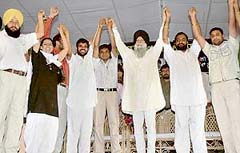 Some of the Congress workers, who joined SAD pose with former Finance Minister Capt Kanwaljit Singh, (third from right) at Zirakpur