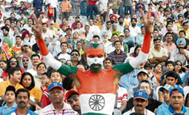 An Indian supporter with the Tricolour painted on his body at the PCA stadium, Mohali