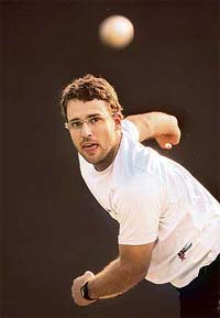 New Zealand�s Daniel Vettori bowls during a training session in Mohali