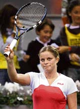 Belgium�s Kim Clijsters rejoices after beating Russia�s Svetlana Kuznetsova in the quarterfinal of the WTA Tour Championship at the Rockodromo Arena Stadium in Madrid on Thursday. Clijsters won 6-1, 6-1. 