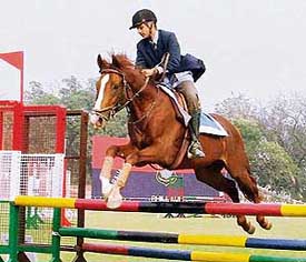 Satnam Singh of Kirpal Sagar Academy, Rahon, clears an obstacle during the 3rd Punjab Horse Show and State Equestrian Championship at PPA, Phillaur, on Saturday. 