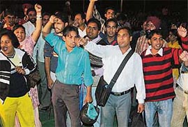 Candidates for the posts of teacher stage a protest at C-DAC Phase-7 Industrial Area, Mohali, on Wednesday.
