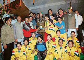 Chief Minister Virbhadra Singh poses with the winning Himachal girls team at the Luhnu ground in Bilaspur