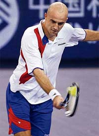 Croatia�s Ivan Ljubicic in action against Argentina�s David Nalbandian at the Tennis Masters Cup in Shanghai