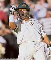 Aussie Michael Hussey jubilates after hitting the winning run on day five of the second Test against England in Adelaide on Tuesday.
