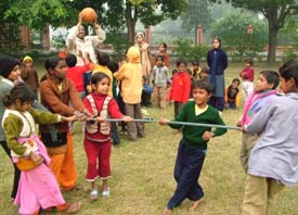 Slum children have fun at Ram Bagh in Amritsar during a picnic organised by the Pingalwara Charitable Society