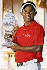 Thongchai Jaidee of Thailand holds the Volvo Masters of Asia 2006 trophy in Bangkok on Sunday.