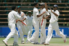 Indian players celebrate after beating South Africa on day four of the first Test at the Wanderers in Johannesburg on Monday.