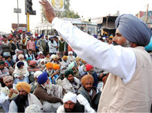 BKU-Ekta activists block road traffic in support of their demands in Bathinda on Wednesday.