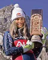 Skier Lindsey Kildow of the US holds a bell presented to her by officials of Val D�Isere after the Women�s World Cup Downhill in Val D�Isere, French Alps on Tuesday. Kildow won the race ahead of Julia Mancuso of the US and Anja Paerson of Sweden.