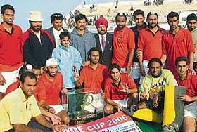 Members of the Sher-e-Jalandhar team in a jubilant mood after winning the Ramesh Chander Memorial Hockey Tournament in Jalandhar