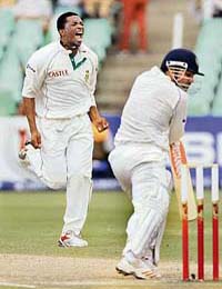 South Africa�s Makhaya Ntini celebrates the dismissal of Virender Sehwag on the fourth day of the second Test at Kingsmead in Durban