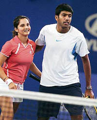 Sania Mirza (left) and Rohan Bopanna celebrate after winning their doubles match against the Czech Republic at the Hopman Cup in Perth on Sunday.