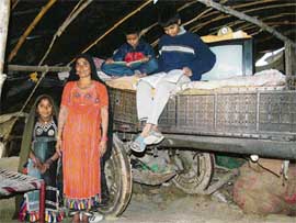 Members of a nomadic tribe at their �dera� at Sarinh village in Jalandhar district on Sunday.