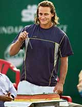 Argentina�s David Nalbandian prepares to cut his birthday cake during the opening ceremony of the Chennai Open tennis tournament on Monday.