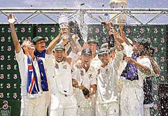 Australian cricketers celebrate after winning the fifth and final Ashes Test against England in Sydney on Friday.  Australia made the first clean sweep of the series in 86 years, winning 5-0.
