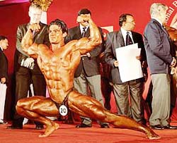 Ankur Sharma of Uttar Pradesh strikes a pose after winning the Mr Samson title at the National Bodybuilding Championship in Mumbai