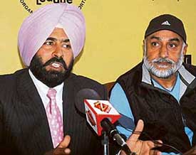 Pargat Singh (left) and Sukhbir Singh Grewal address a press conference in Chandigarh
