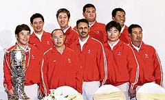 Jeev Milkha Singh (extreme right, bottom row) poses with his Asian teammates during a news conference at a hotel in Bangkok