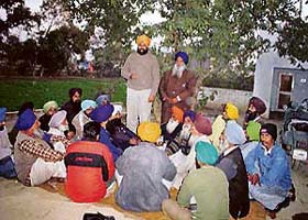 SAD (A) candidate Emman Mann holds a corner meeting with voters of his constituency