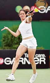 Switzerland�s Patty Schnyder returns the ball during her match against Madison Brengle of the US at the Australian Open in Melbourne