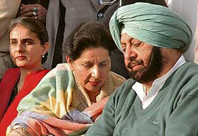 The Chief Minister, Capt Amarinder Singh, with his wife and MP, Ms Perneet Singh, in Patiala on Friday.