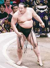 Mongolia�s Asashoryu rejoices after defeating Ozeki Tochiazuma in the title bout of the New Year Grand Sumo Tournament in Tokyo