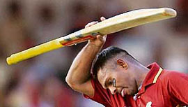 West Indies batsman Shivnarine Chanderpaul wipes his brow following his team�s defeat in the first one-dayer against India at the Vidarbha Cricket Association Stadium in Nagpur on Sunday.