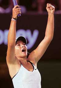 Maria Sharapova of Russia celebrates her victory over compatriot Vera Zvonareva in their fourth-round match at the Australian Open in Melbourne on Monday. Sharapova won 7-5, 6-4.